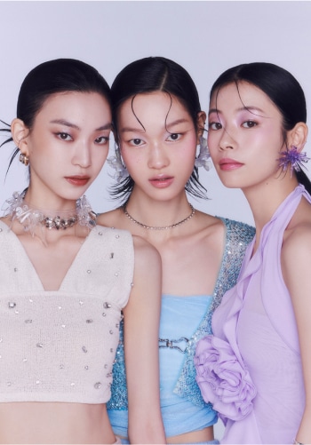 Three models with White Holographic Makeup, Glitter Kissed Lavender makeup, and Shimmer Smoky makeup